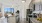 kitchen island and living room with wood flooring