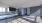 Indoor exercise room for yoga or zumba, featuring mirrored walls, television, and a beautiful view out the window. 